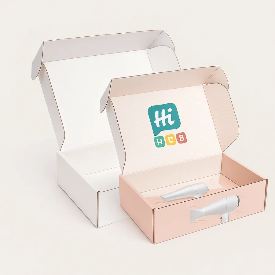 Two open salmon-pink and white gift-style boxes showing internal branding and hair dryer illustrations- class=